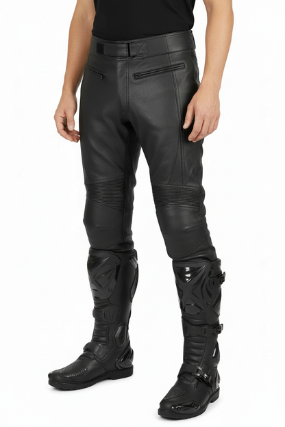 Person wearing leather motorcycle pants with racing boots